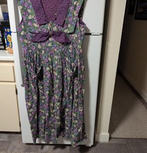Floral Purple and sleevless maxi dress with removable shawl collar and pockets.